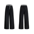 Men's straight-leg casual trousers with drooping design and button detail in black or grey