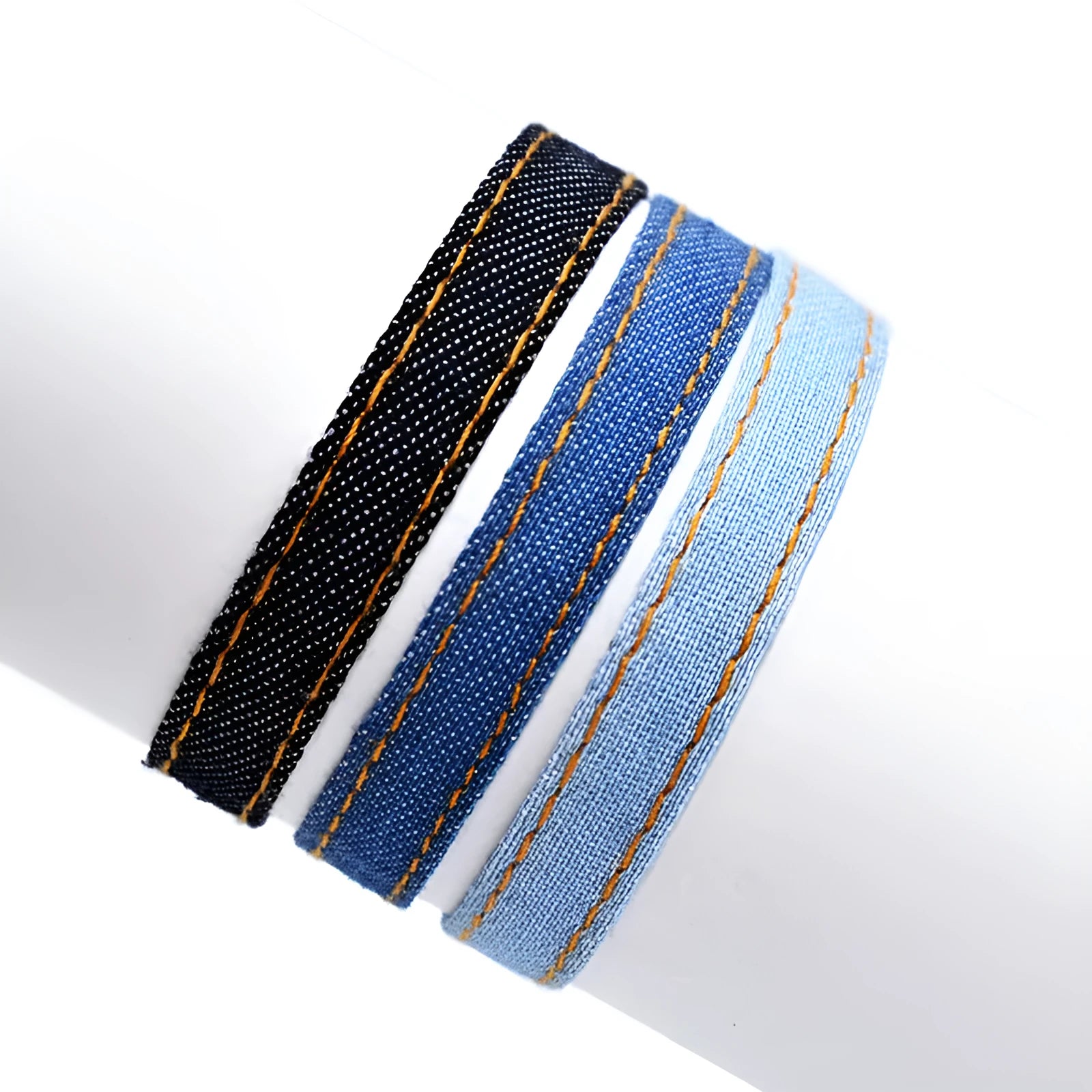 Unisex denim fabric bracelet with an attached carrying strap in a selection of colours.