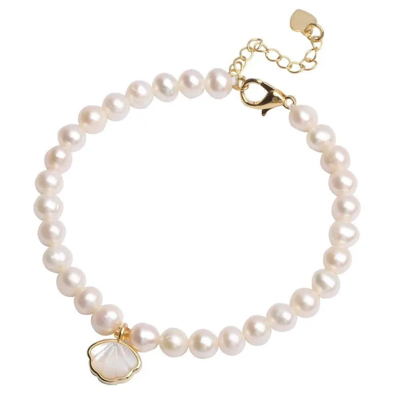 Women's freshwater pearl fan-shaped bracelet with elastic string or extension chain option, 16cm length.