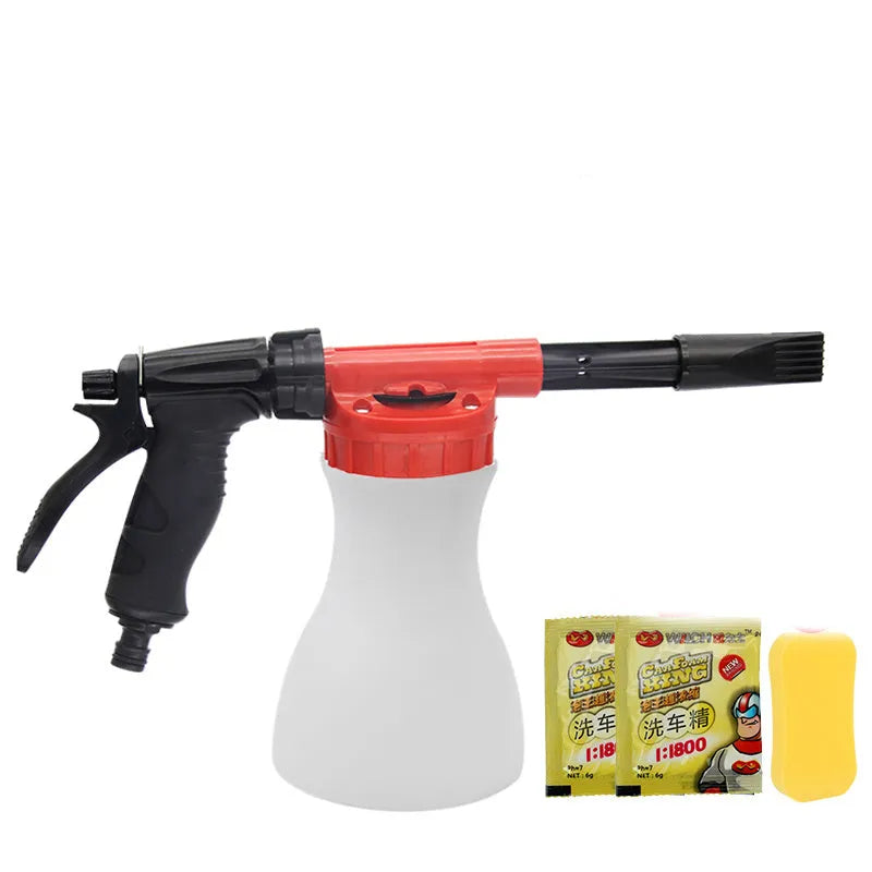 Blue handheld foam pot high pressure water gun for garden spraying on a garden table