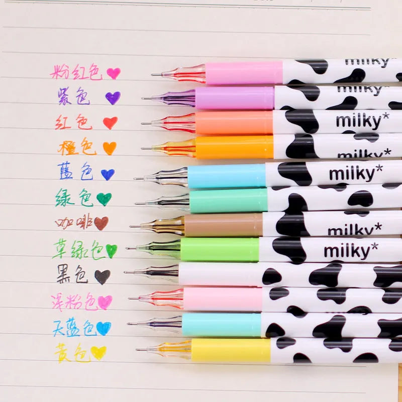 Box of twelve cow pattern gel pens with 0.38mm tips in assorted colours.