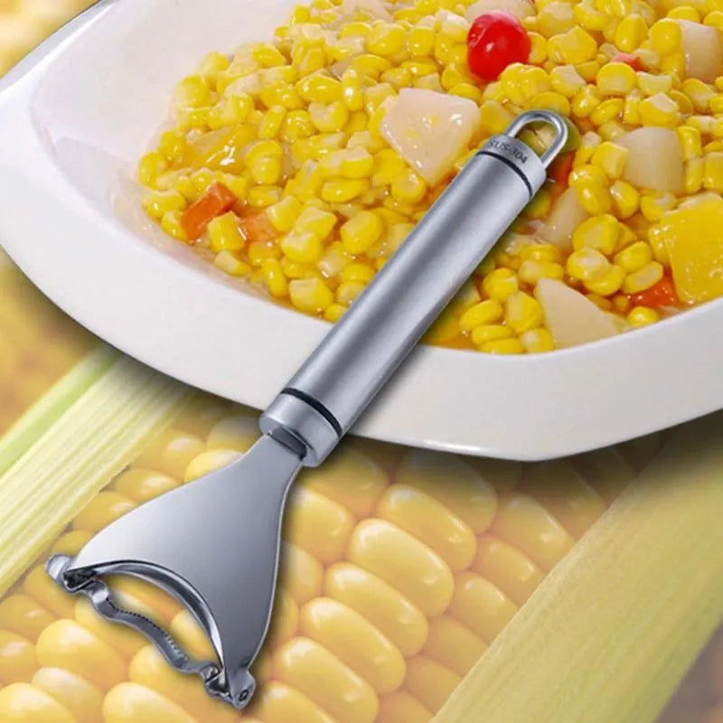 Stainless steel corn planer with silver finish on a kitchen surface measuring 18cm long