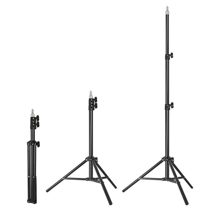Frosted finish tripod light stand extended to full height with a mobile phone holder attached.