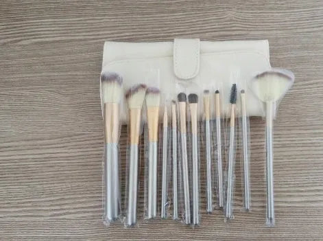 Persian make-up brush set with white bristles and champagne handles in professional case