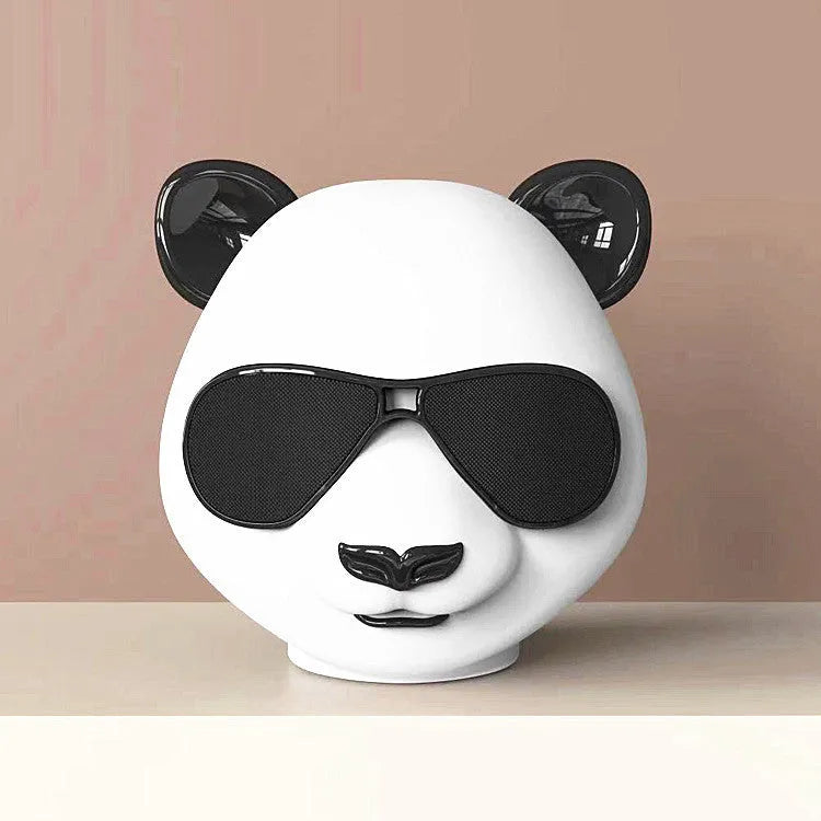Classic style portable mini Bluetooth speaker shown with USB charging cable