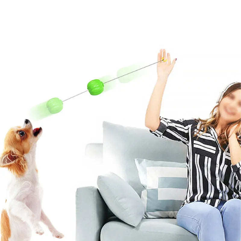Orange pumpkin-shaped dog chew ball with squeaker for small dogs, measuring 69mm diameter