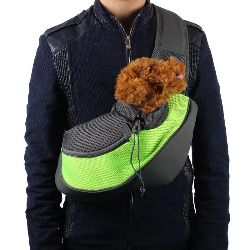 Polyester pet backpack carrier for a small dog, shown in blue colour.