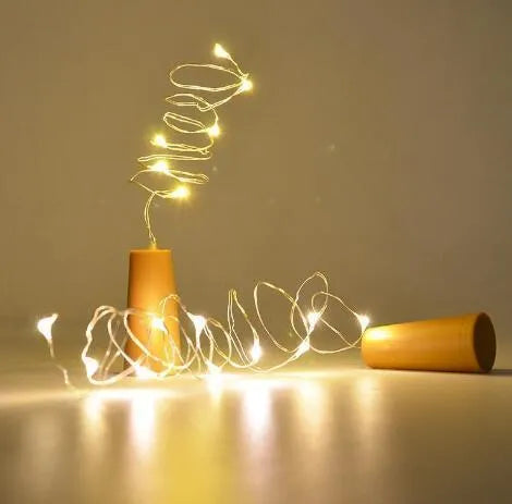 Bendable copper wire LED string light with 20 bulbs and a plastic bottle stopper for decorative lighting