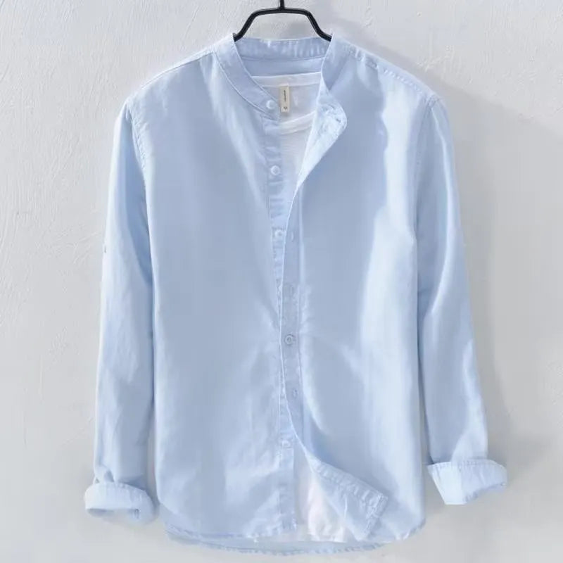 Men's loose fit long sleeve linen cotton shirt in solid colours on a hanger