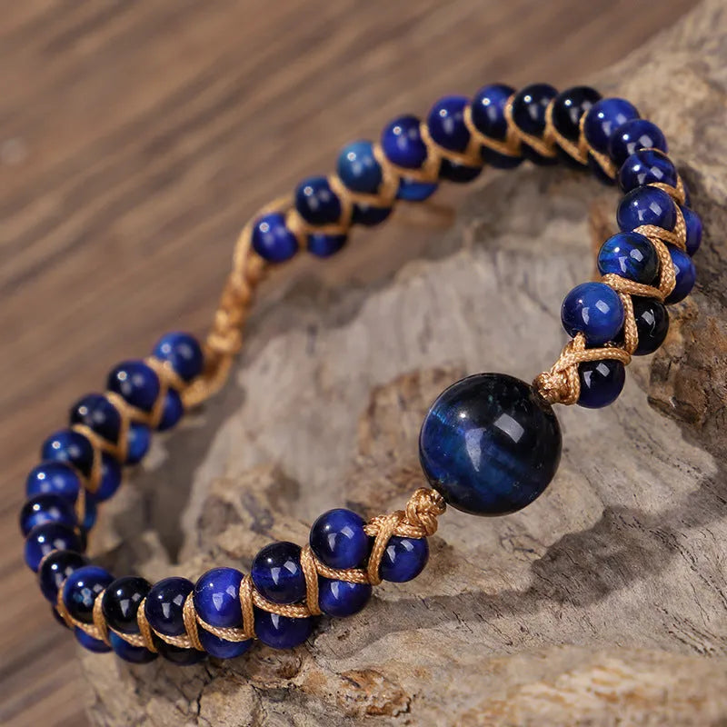 Handmade geometric woven pull bracelet in blue Tigereye stone with visible banding patterns