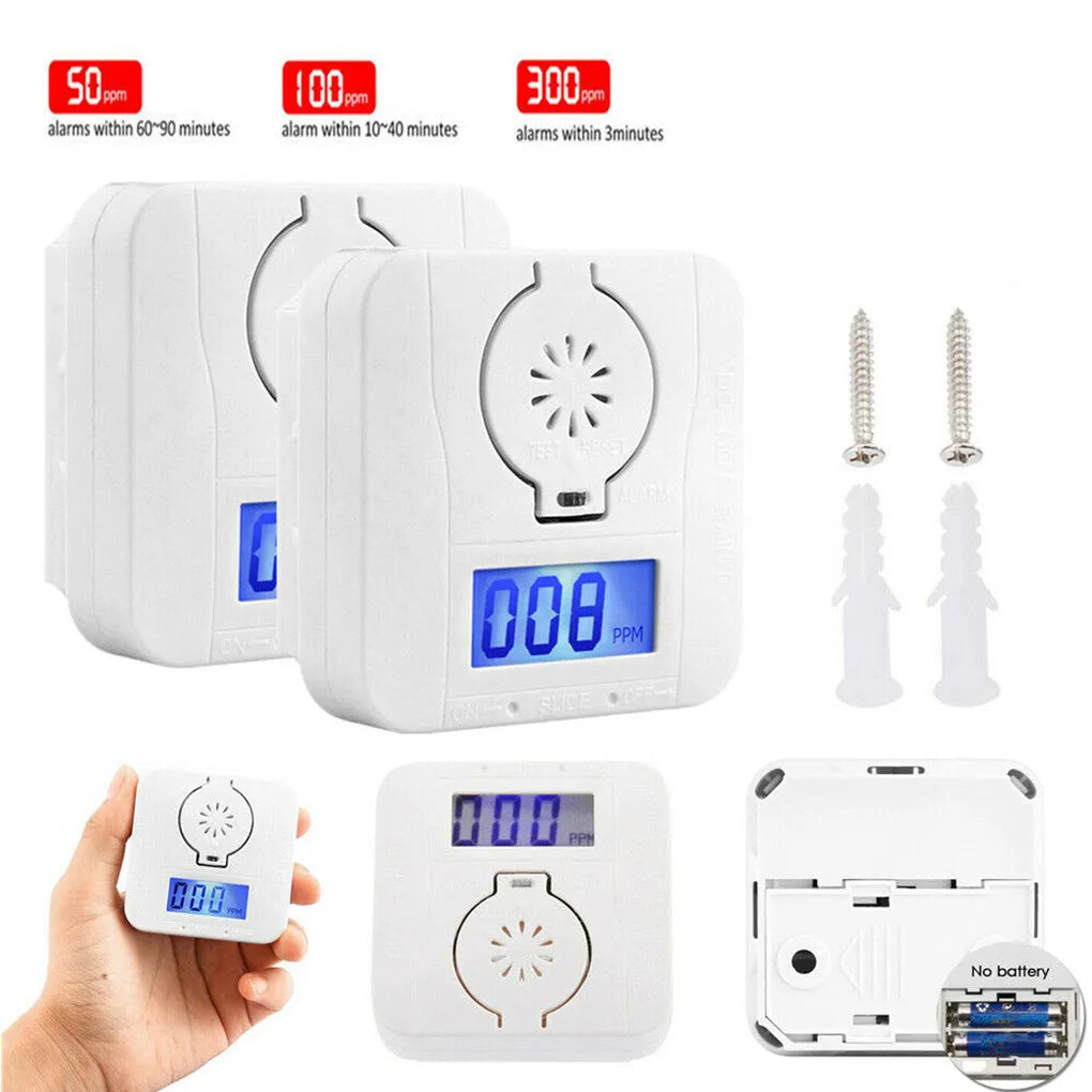 White wireless carbon monoxide alarm mounted on a wall for detecting coal stove gas.