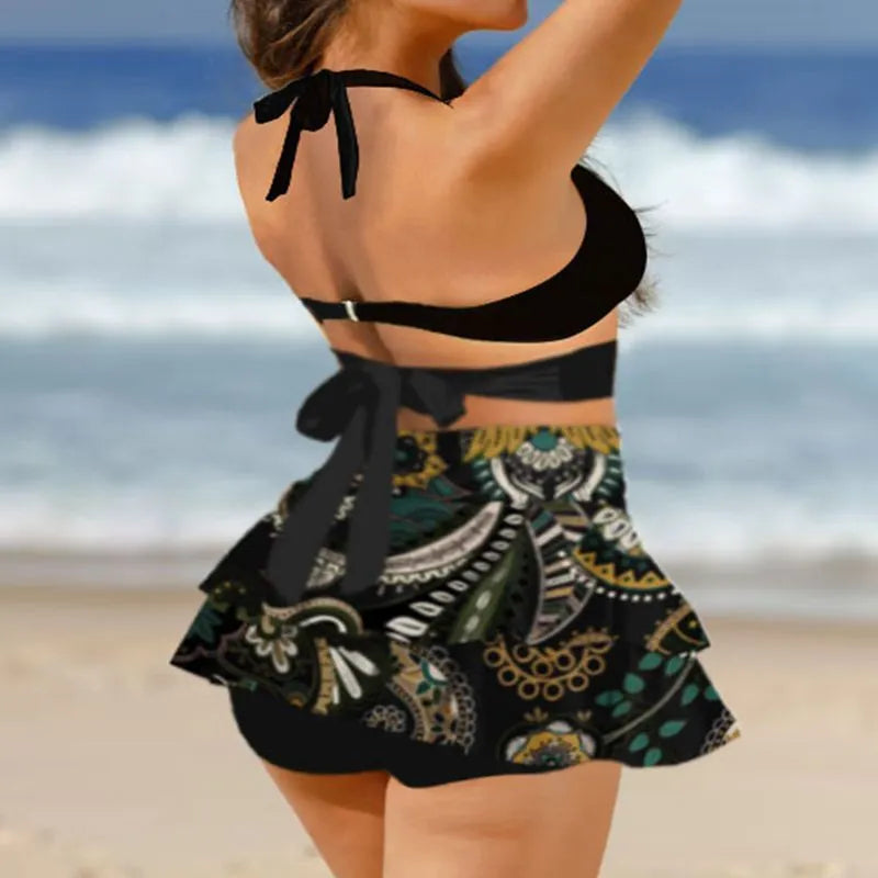 Women's purple bikini set with lace-up detail on split skirt and high-waist briefs.