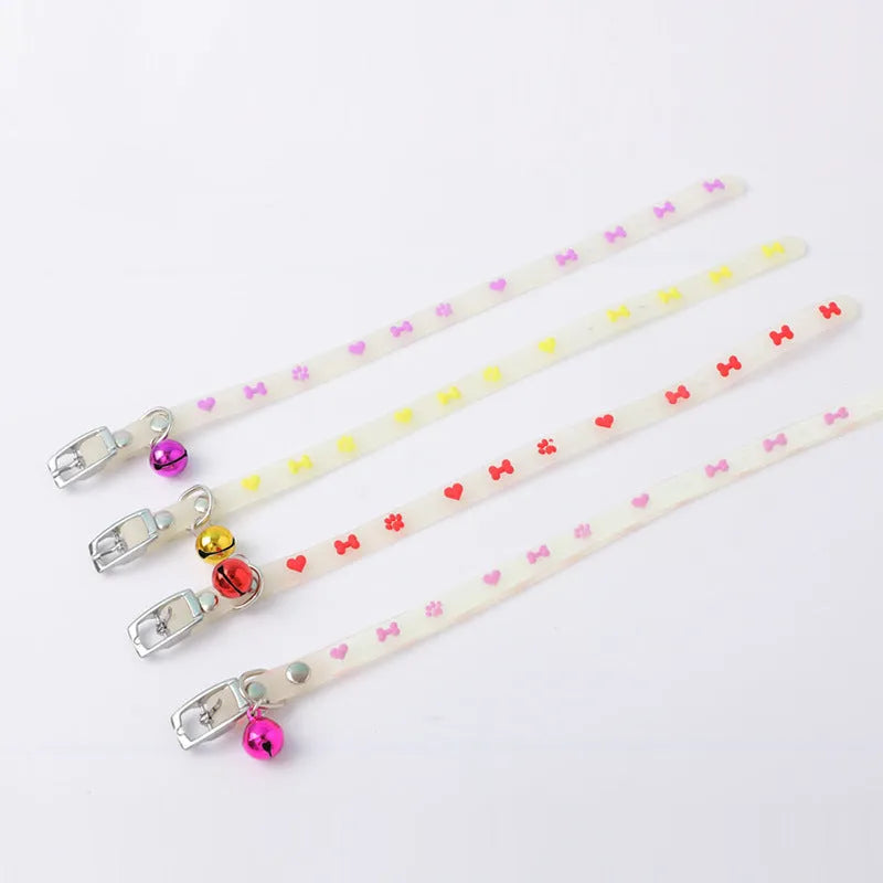 Luminous cat collar with adjustable silicone chain and metal bell in paw print design