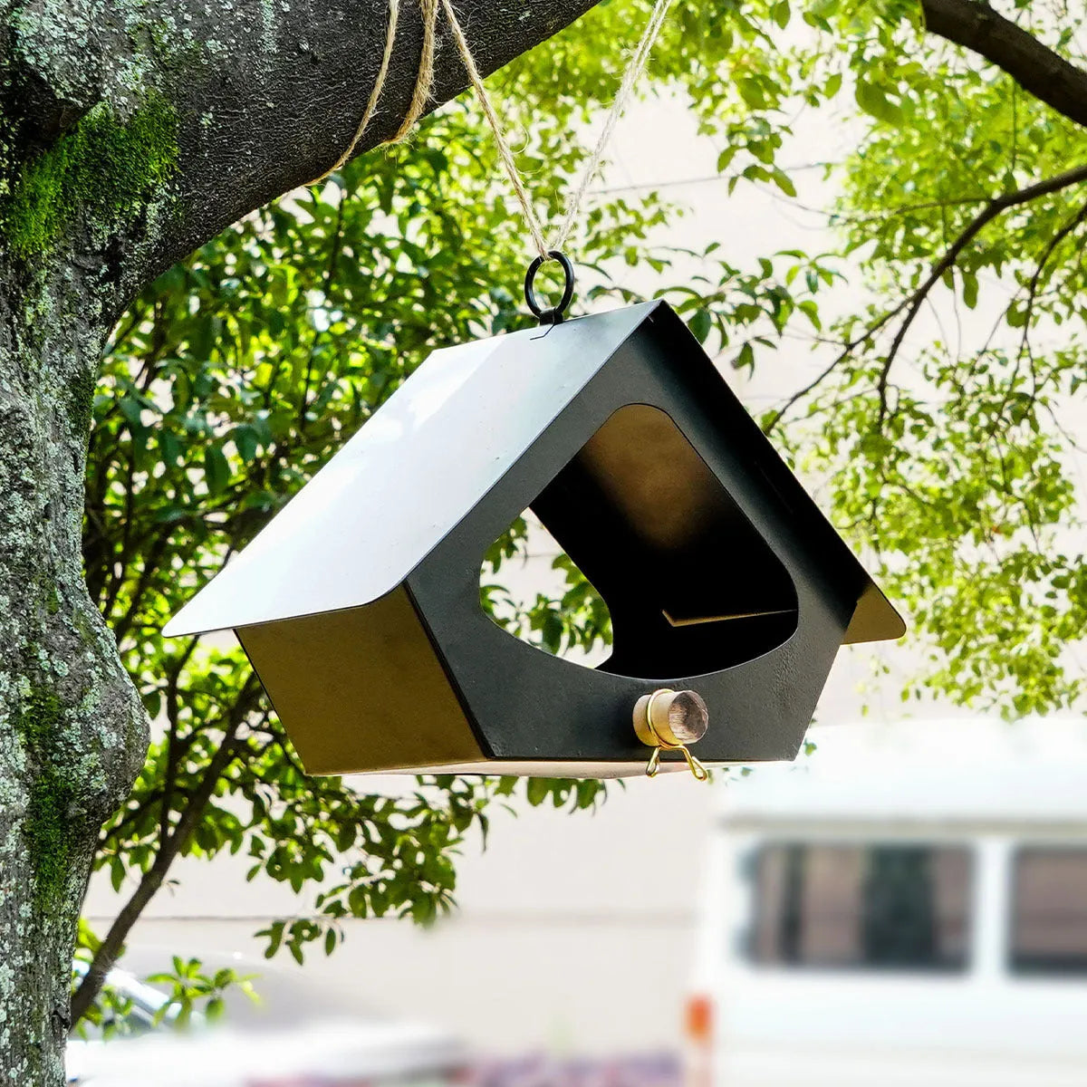 Simple modern iron bird nest decoration for outdoor garden use in grey and black colour options.
