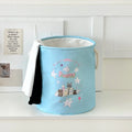 Foldable cotton laundry basket in decorative pattern options including Good Night Bear and Mint Green Western Highland
