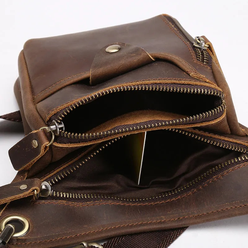 Men's brown genuine crazy horse leather vintage satchel bag with adjustable strap and flap closure.