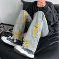 Green ripped jeans for men with raw embroidery, loose fit denim, available in sizes S to 3XL