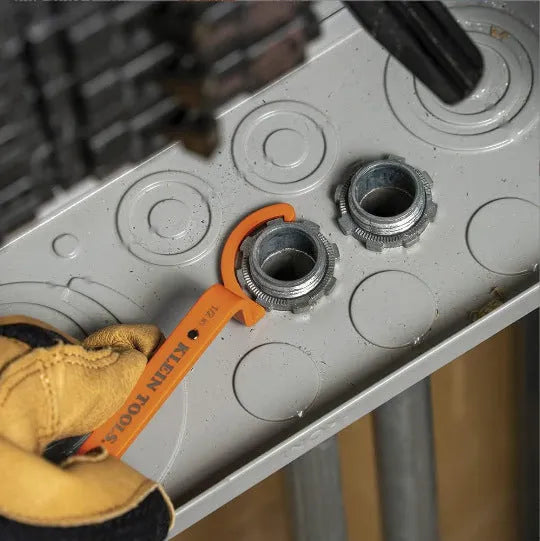 Three crescent wrenches with magnetic suction and catheter locking in orange, grey, and black colours