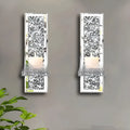 Pair of tall silver mirror glass wall-hanging candle holders with modern crystal design.