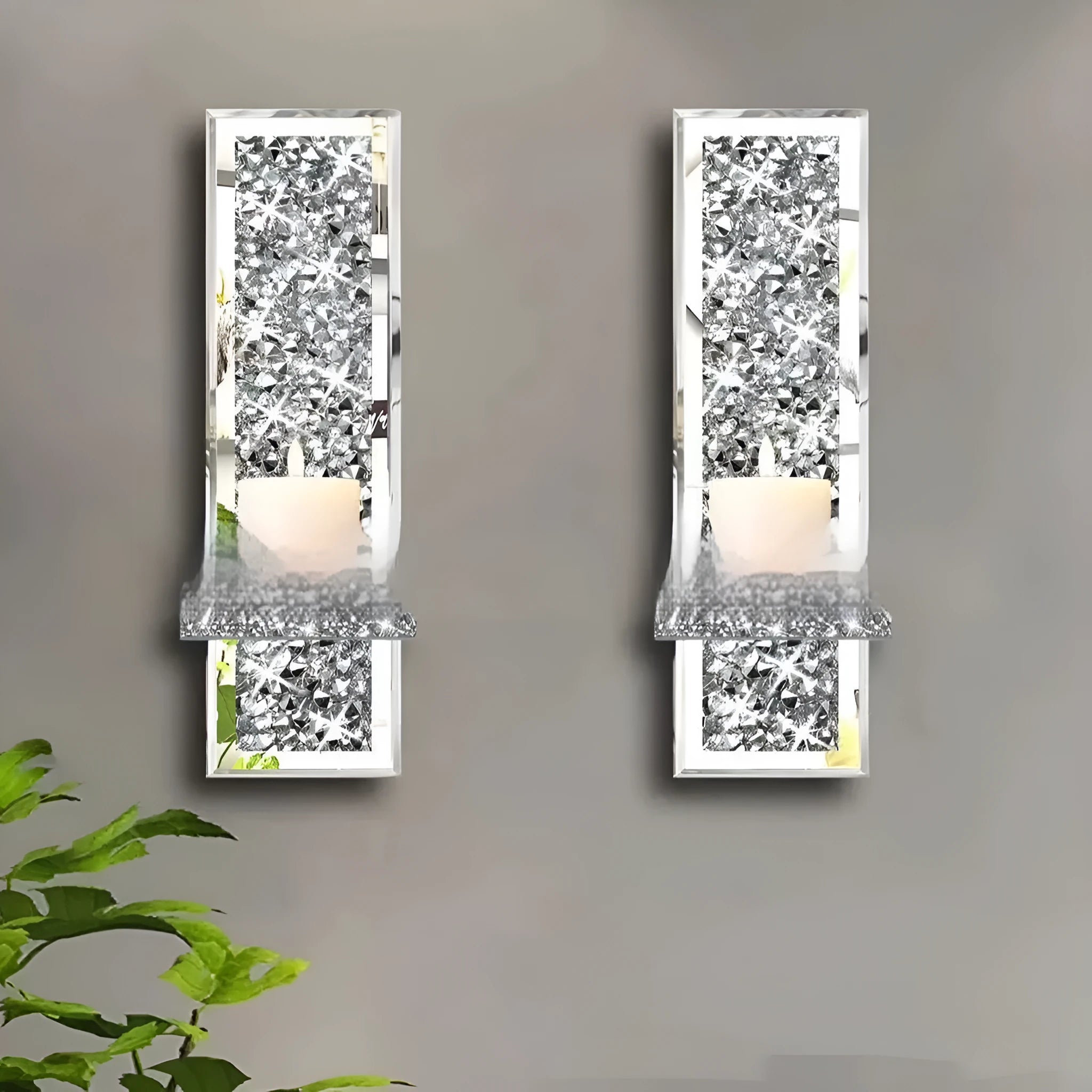 Pair of tall silver mirror glass wall-hanging candle holders with modern crystal design.