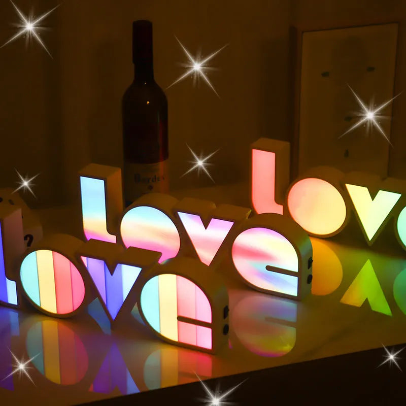 LED LOVE Light with rainbow-coloured lampshade displaying LOVE word for romantic decoration