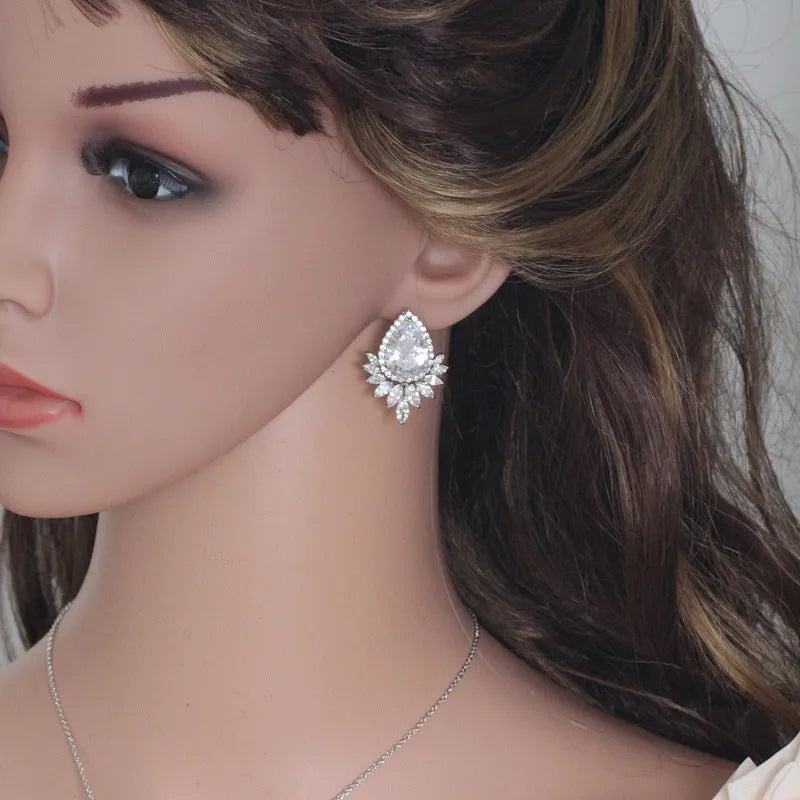 AAA formal jewellery set with necklace and earrings featuring cubic zirconia stones and crystal accents in blue, red, or white.