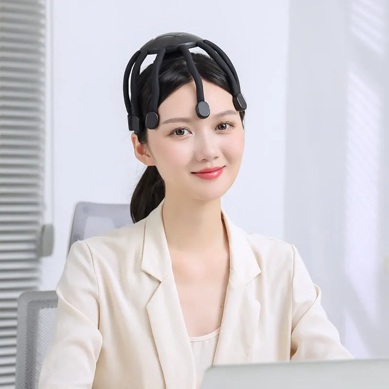USB-powered head massager with multiple massage claws for scalp tension relief