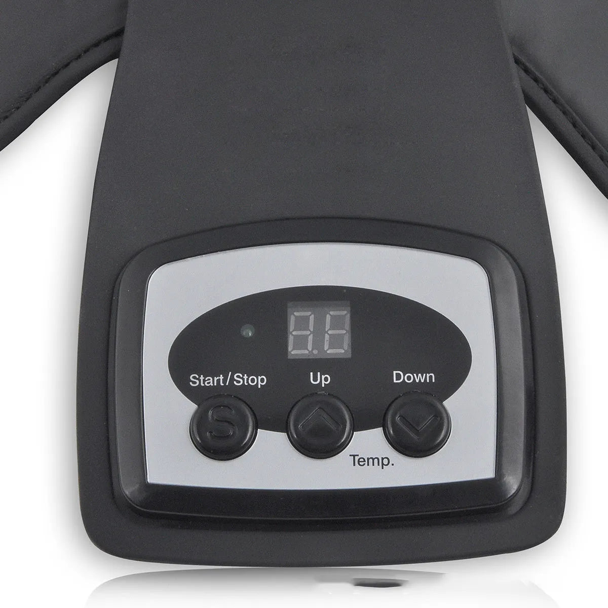 Infrared heat therapy knee and shoulder massager with pads and power adapter on a table.