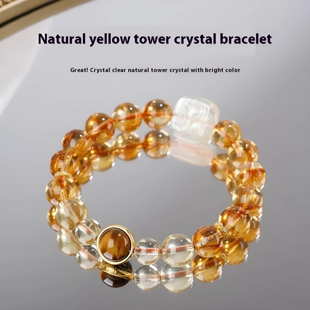Women's ethnic style bracelet with a carved 10mm citrine crystal geometry bead.