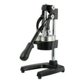 Black and white manual citrus juicer with cast iron base and stainless steel funnel