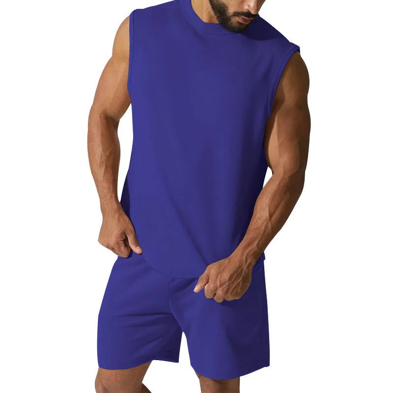 Men's sleeveless cotton-blend sports suit showing matching T-shirt top and shorts in a solid colour.