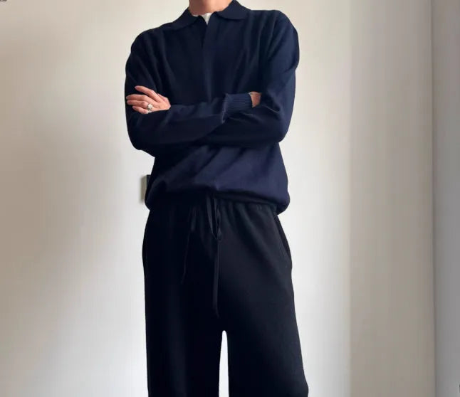 Pure wool loose-fit polo sweater with a lapel collar in navy blue colour.