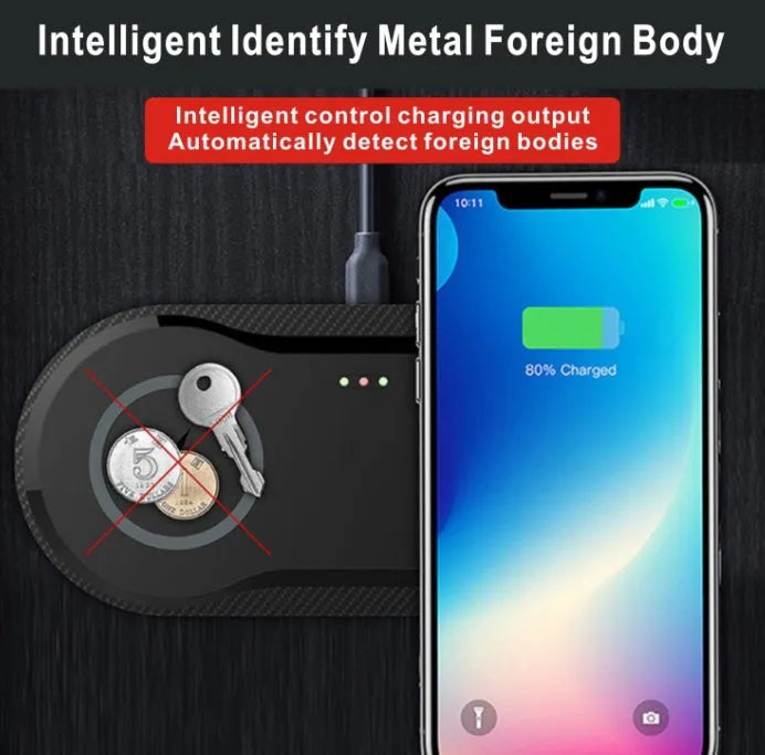 Black dual wireless charging pad charging two smartphones simultaneously on desk