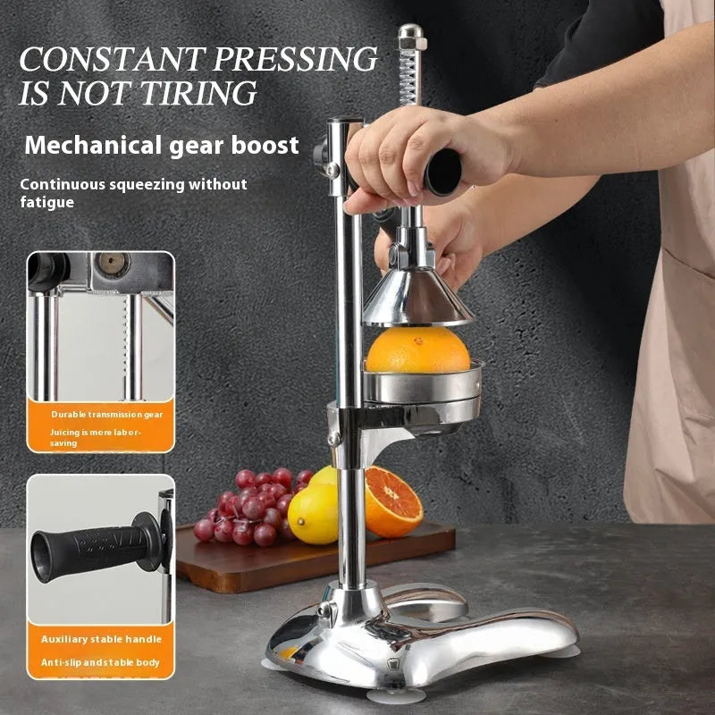 Vertical stainless steel manual citrus juicer on a kitchen countertop.