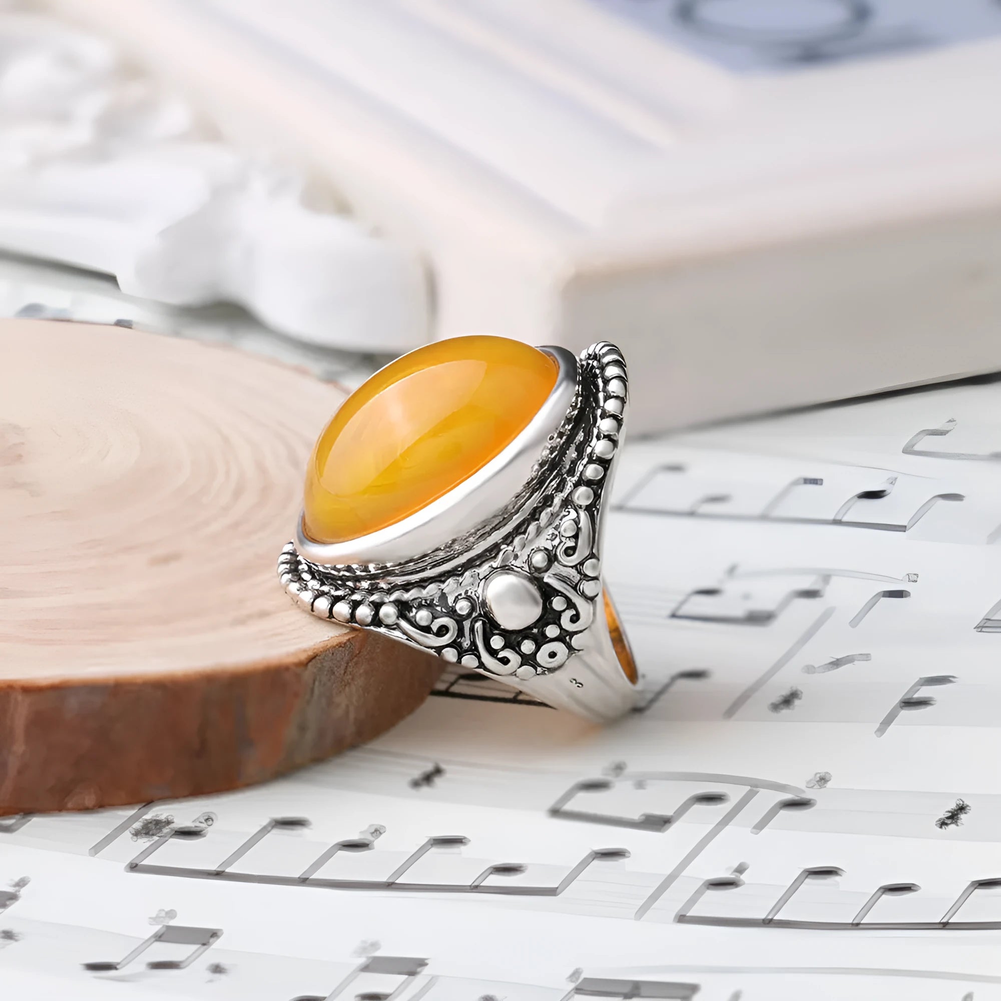 Geometric retro alloy ring with fluorescent beeswax centrepiece in antique silver Amber colour