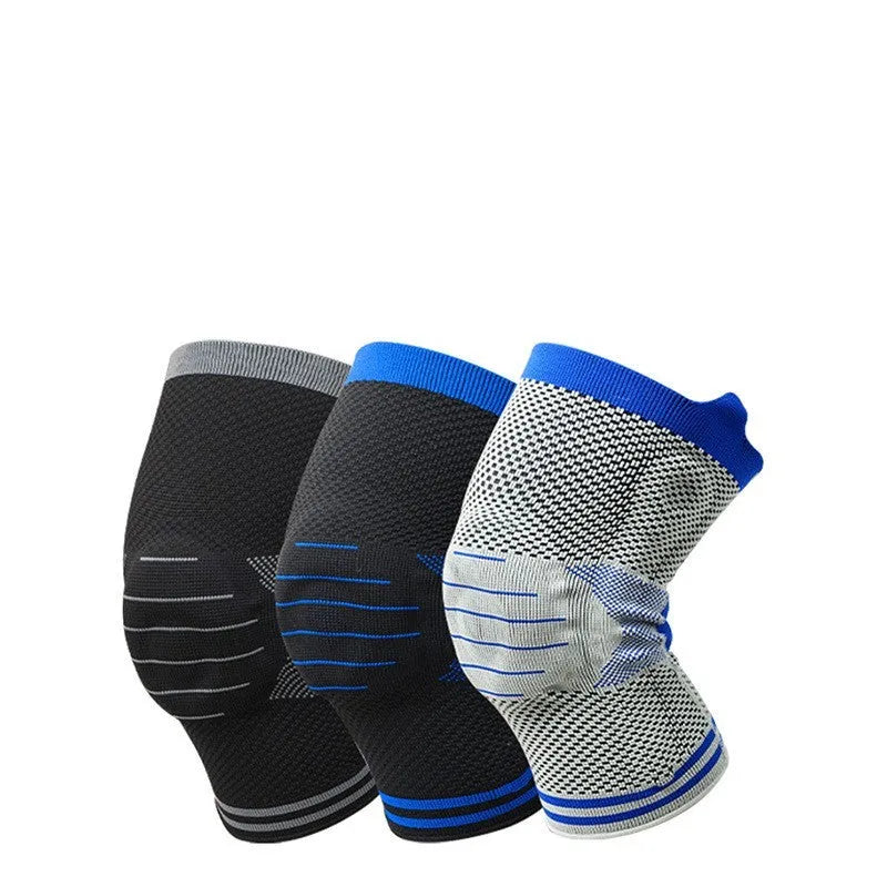 Silicone massage spring bar shock absorber knee pad in black and blue colour, shown with cotton material and sizing tag.