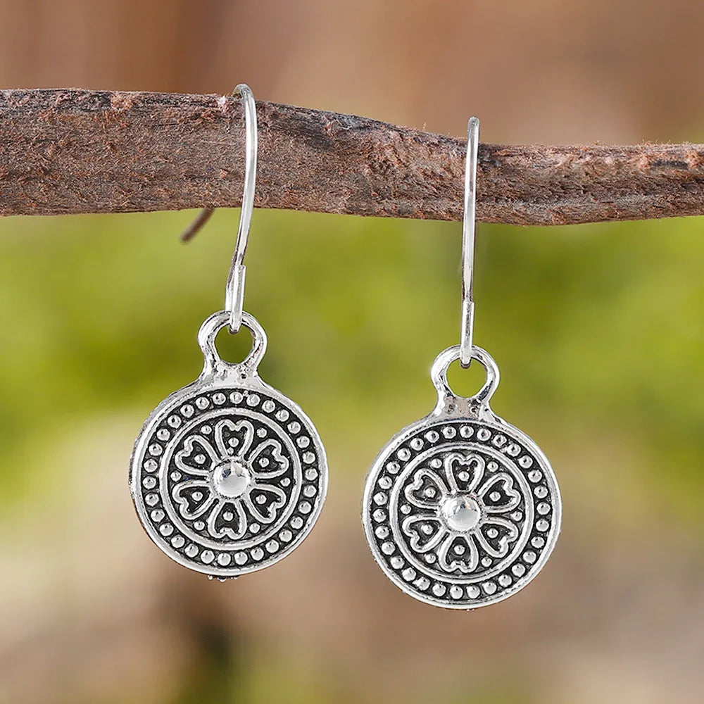 Geometric bohemian style earrings with distressed retro round ethnic print in zinc alloy