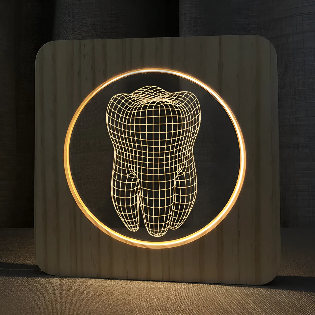 Wood colour tooth-shaped acrylic night light on a surface with USB cable.