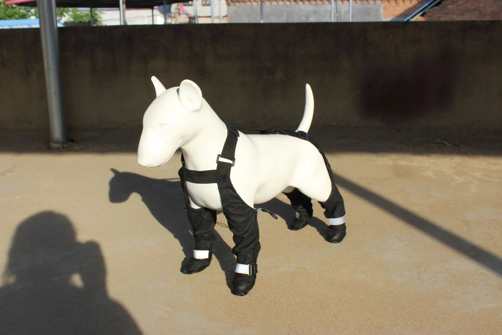 Black waterproof non-slip dog shoes with adjustable straps in sizes XS S M L XL XXL