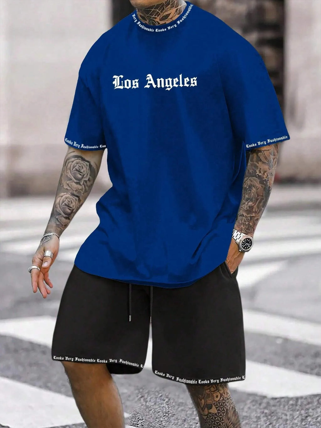 Men's quick-dry polyester sportswear set showing short-sleeved top and matching shorts in a solid colour.
