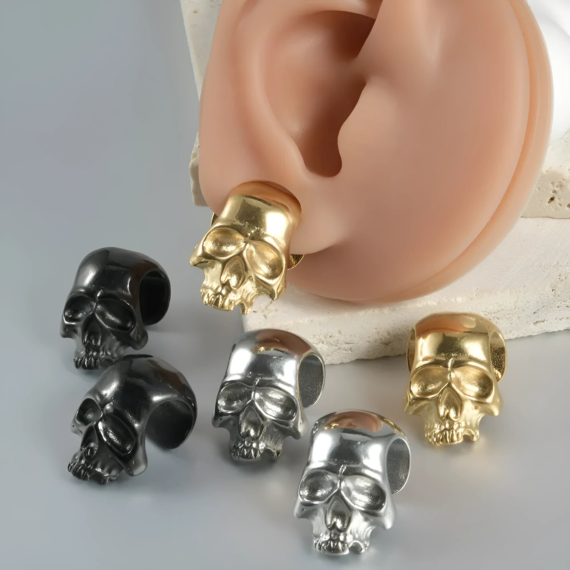 Personalised stainless steel hollow skull Buddha earrings with electroplated colour finishes
