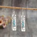 Silver geometric long strip earrings with turquoise inlay detailing and retro styling