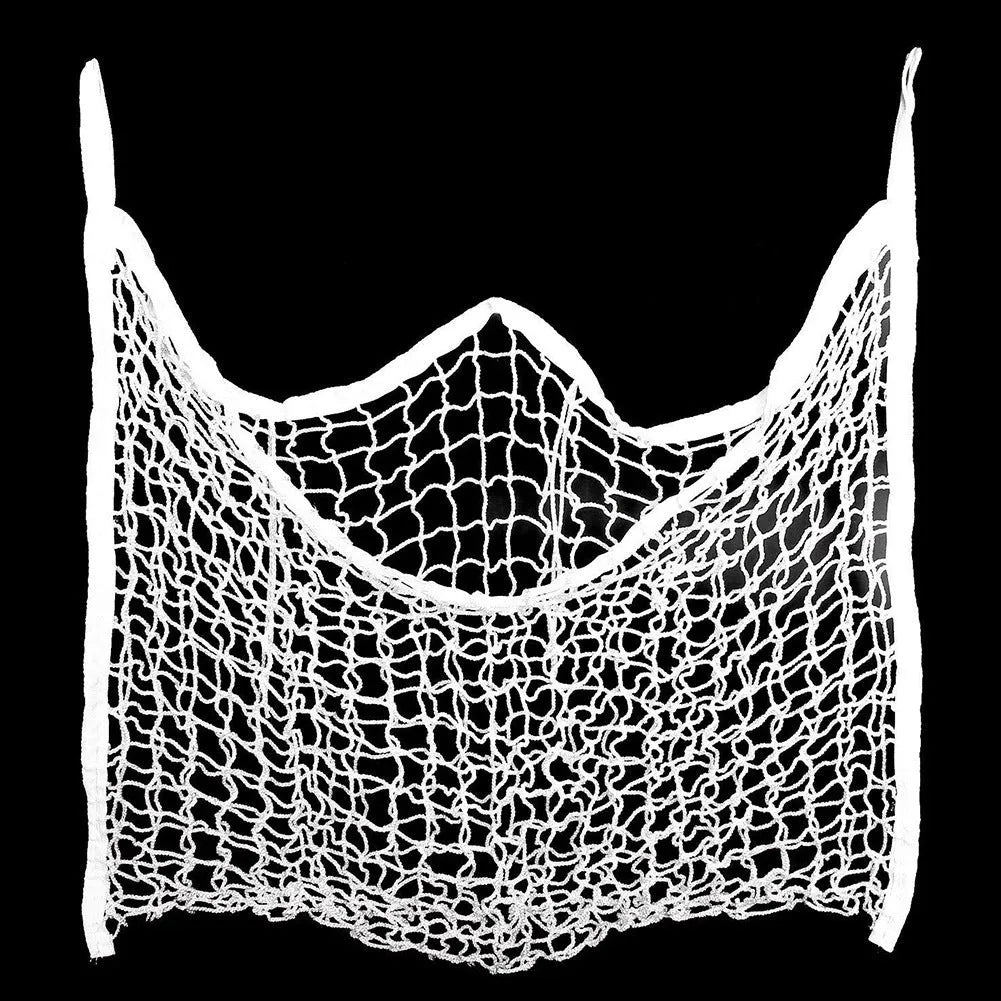 Black woven PE rope mesh feeding bag for horses hanging on a fence