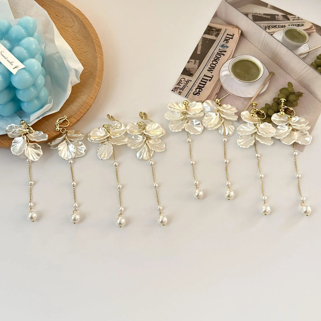 Women's acrylic shell pearl tassel earrings showing four clip types and 8.8cm length