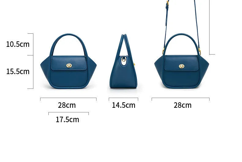 Women's leather wing handbag in blue with buckle decoration and shoulder strap