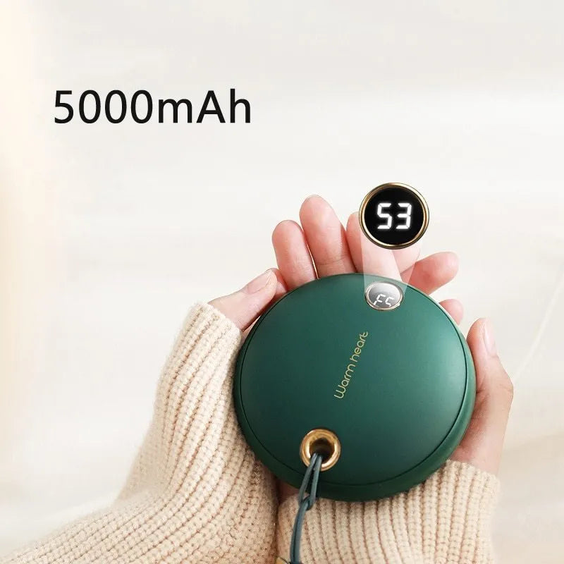 Green hand warmer power bank with digital display showing battery percentage, USB Type-C cable included