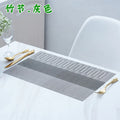 PVC non-slip place mat in gradient bamboo colour on a kitchen countertop.