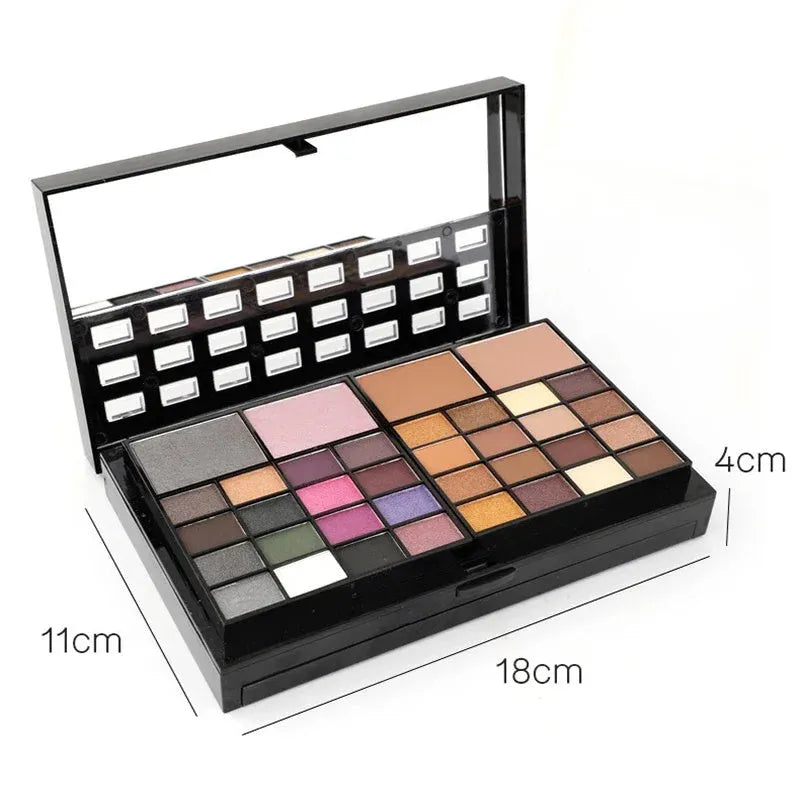 74 colour makeup palette open showing eyeshadows, lip glosses, and face powders with brushes