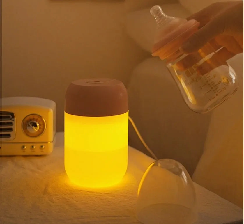 Small white cylindrical USB-powered humidifier with aromatherapy function