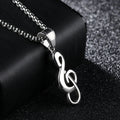 Gold music symbol pendant made from titanium steel on a chain